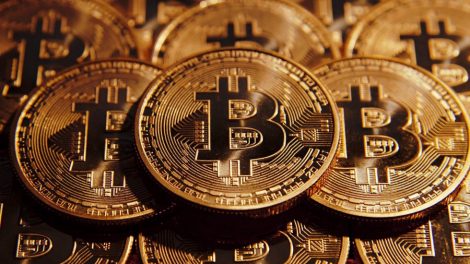 Trois pièces de Bitcoin